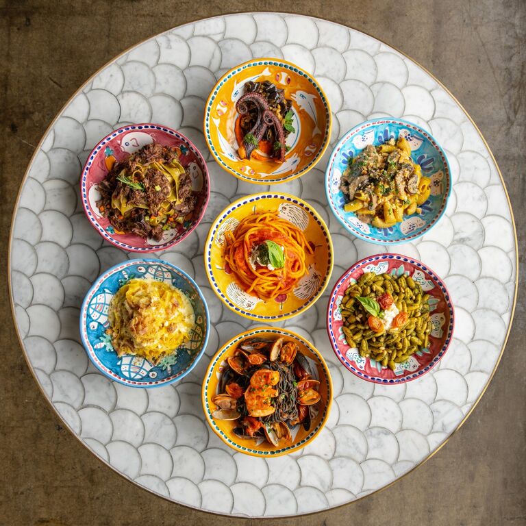 A gorgeous assortment of dishes in beautiful crockery