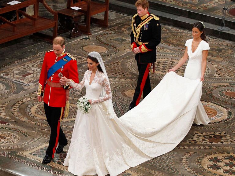 Kate and Will walk down the aisle with Harry and Pippa behind them. 
