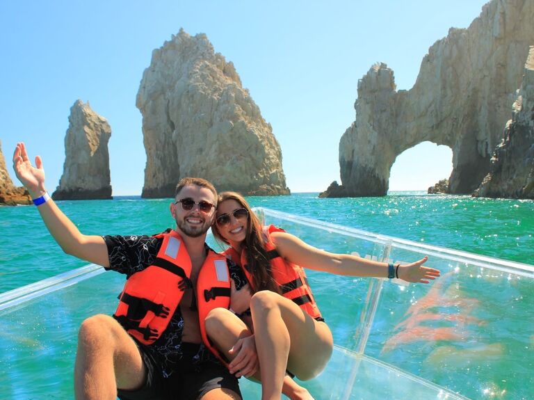 Jake and Madi on a glass bottom boat ride to the famous Cabo arch.