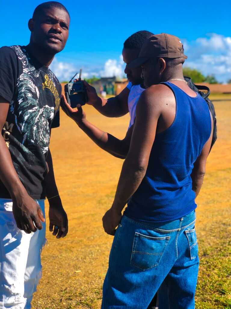 Joseph's teaching drone flying to family and friends in Clarendon, Jamaica