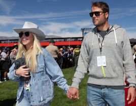 Los Angeles Rams quarterback Matthew Stafford (R) and wife Kelly Stafford walk the red carpet