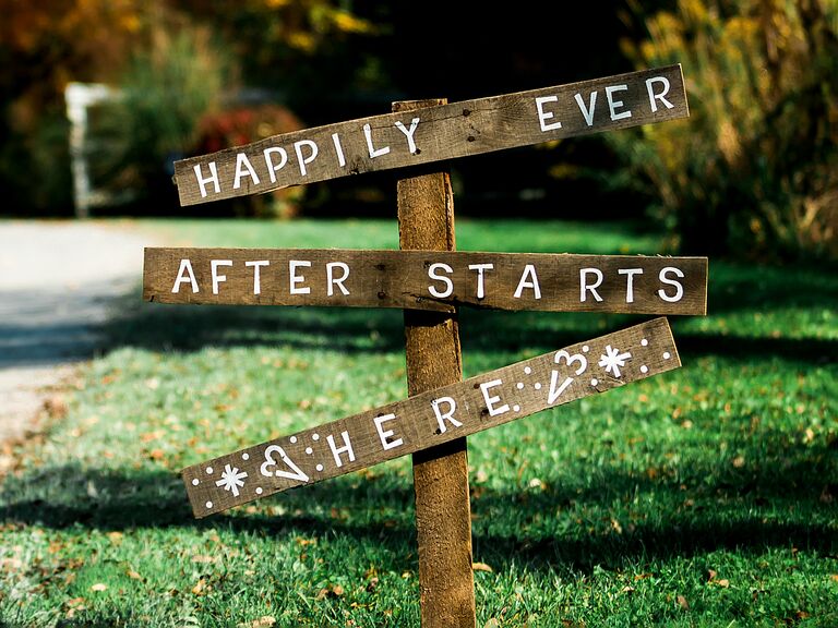 Wedding sign says happily ever after starts here 