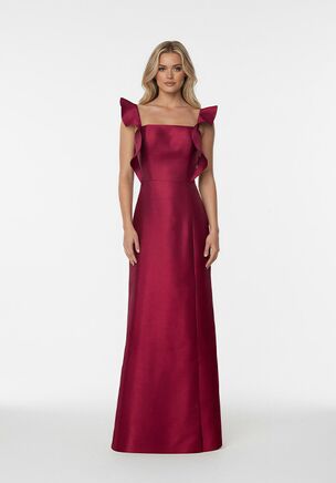 Crafted in Lux Mikado, this floor-length A-line bridesmaid dress features a flattering natural waistline and a comfortable stretch lining for effortless wear. A modern square neckline is softened by ruffled shoulder details that taper gently past the shoulders, adding a touch of romance and movement. Polished, playful, and easy to wear, it’s the perfect choice for a beautifully coordinated bridal party.