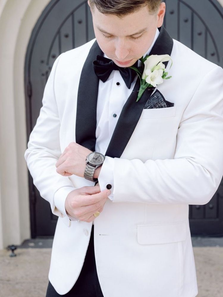 groom in black-and-white tux