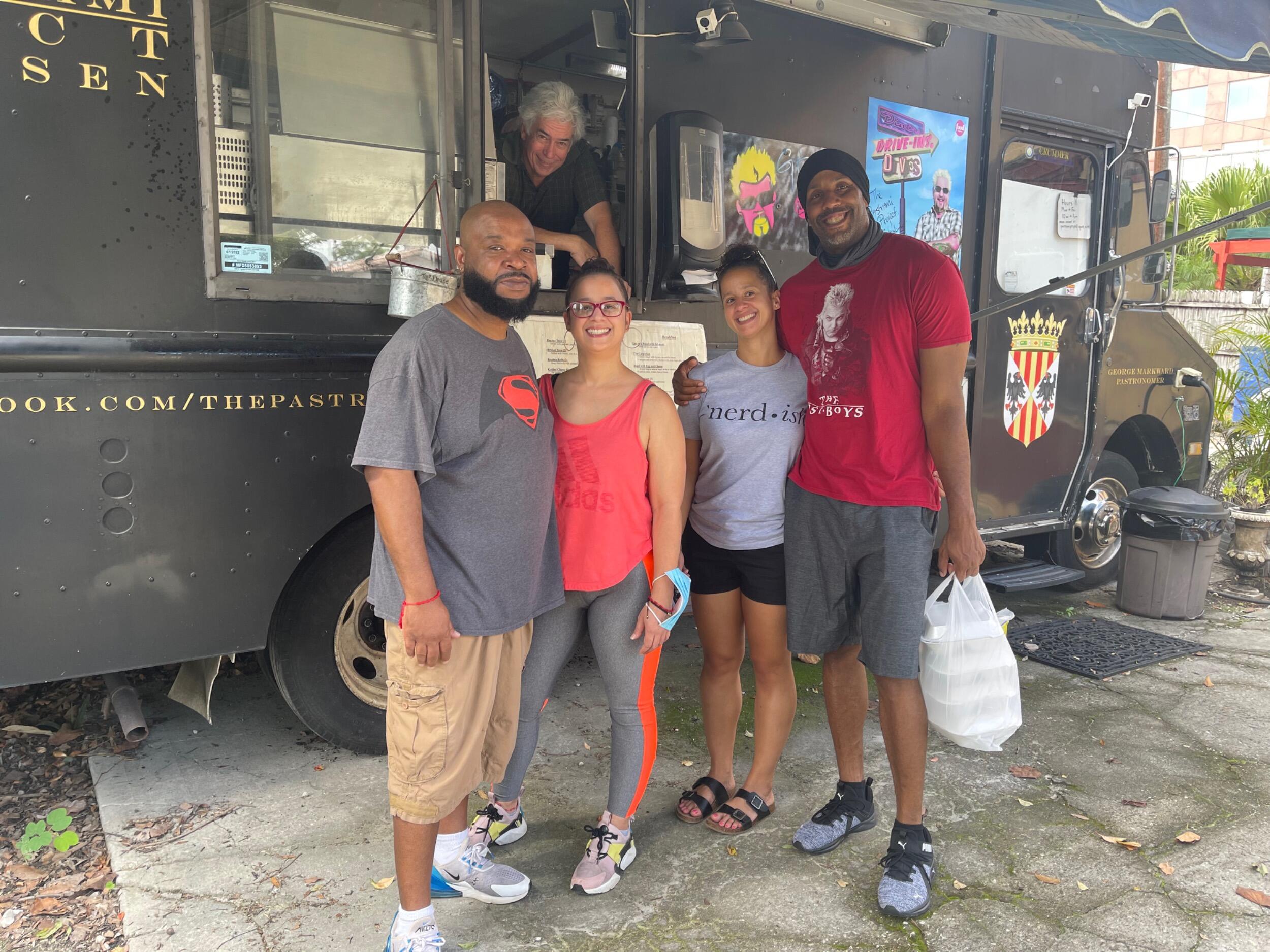 Hanging out in Florida:  We found a Diners, Drive-ins, and Dives food truck and gave it a try.  We are chillin with Bebe and Claude.