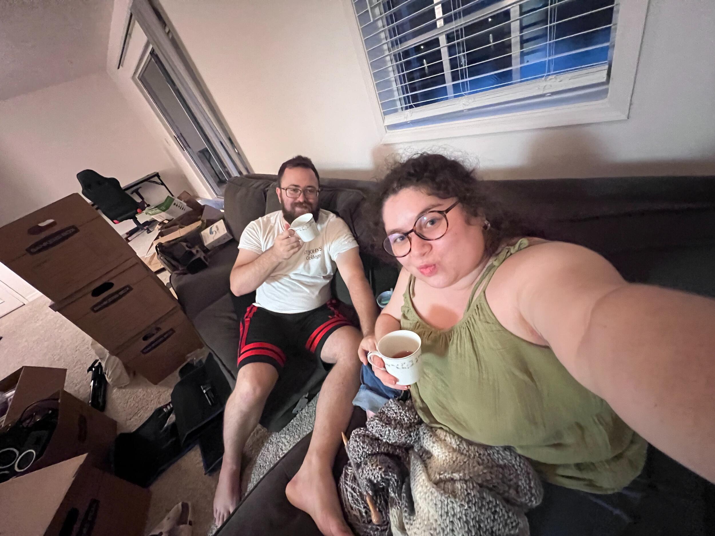 Overjoyed to be living in the same zip code, Lisette and Francis enjoy their first cup of tea in his new apartment. 