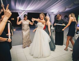 Bride dancing with her guests on the dance floor