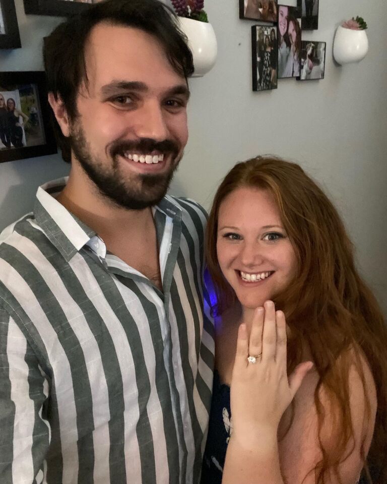 On Friday Night after yoga, Bryan and Kathleen came home and Bryan snuck upstairs to grab the ring. As he was proposing, Missy jumped on Kathleen's lap and started licking Bryan's face before he could finish asking her to marry him. Finally, after giving his schpiel, he said, can you hold this ring for a second? Kathleen is still holding it for him to this day.
