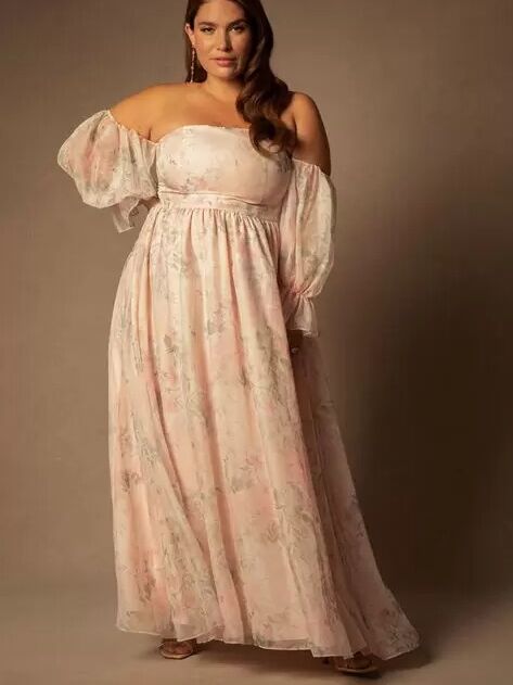 An over-the-shoulder floral maxi dress with balloon sleeves from ELOQUII