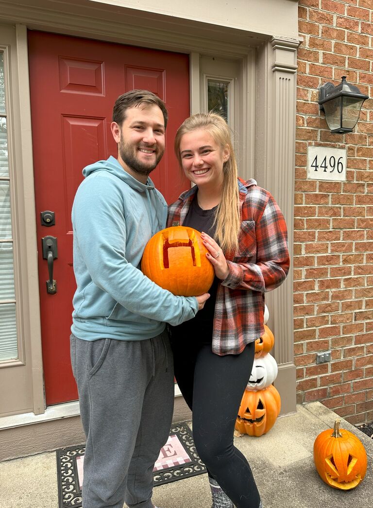 Carving pumpkins at our house.