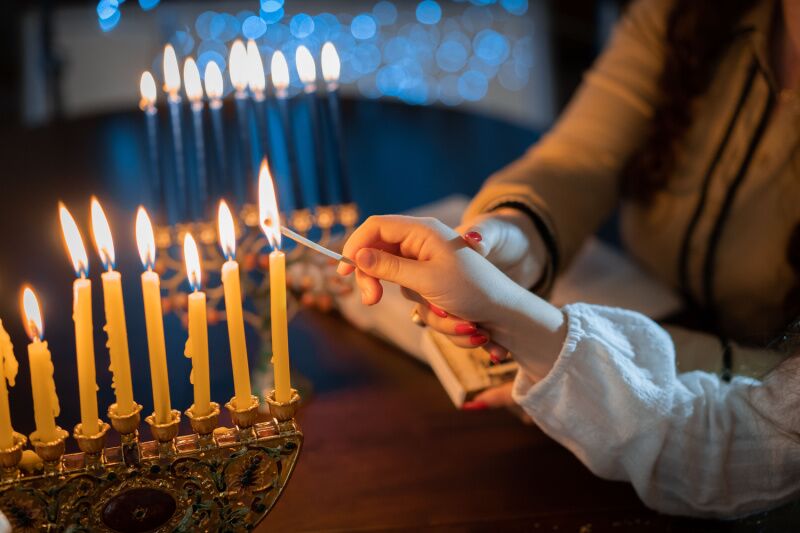 Hanukkah party idea - lighting the menorah