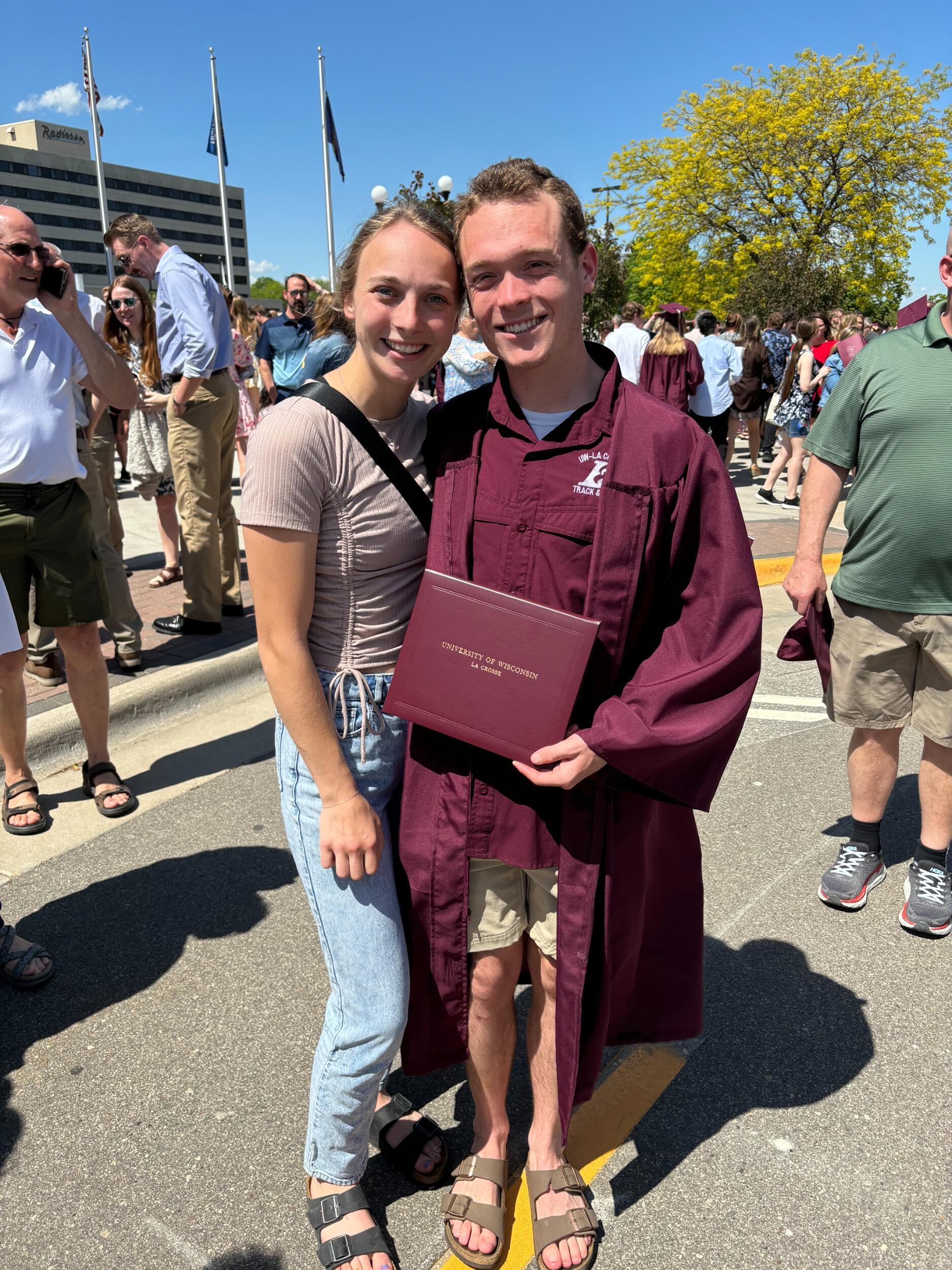 2 years later Ethan FINALLY graduated with a degree in Sociology where he enjoyed running more than studying. 