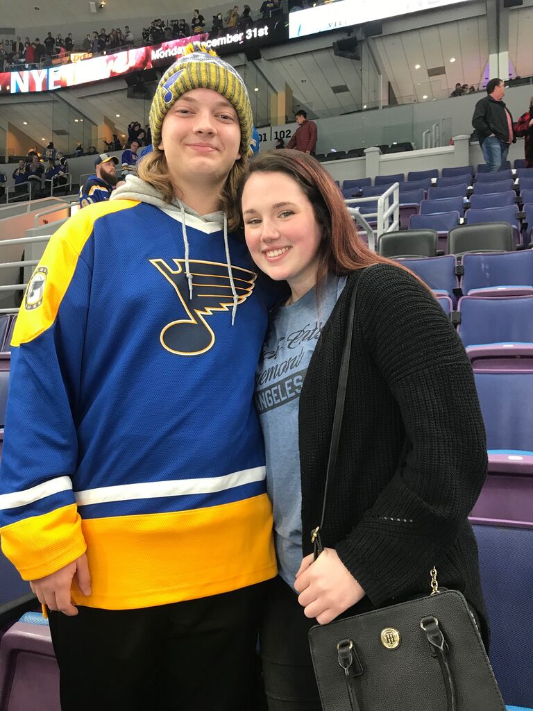This is a photo from our first date!
Robert brought Victoria to her first hockey game. It all came full circle now that they both work there!