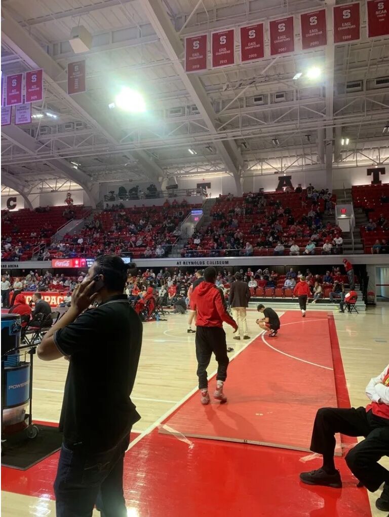 Katlyn and Ed "meet" for the first time at Reynolds Coliseum