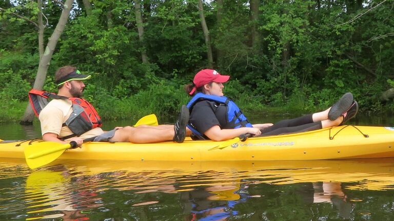One thing we both love is being outdoors. A candid photo of Zack and I taking kayaking VERY seriously haha.