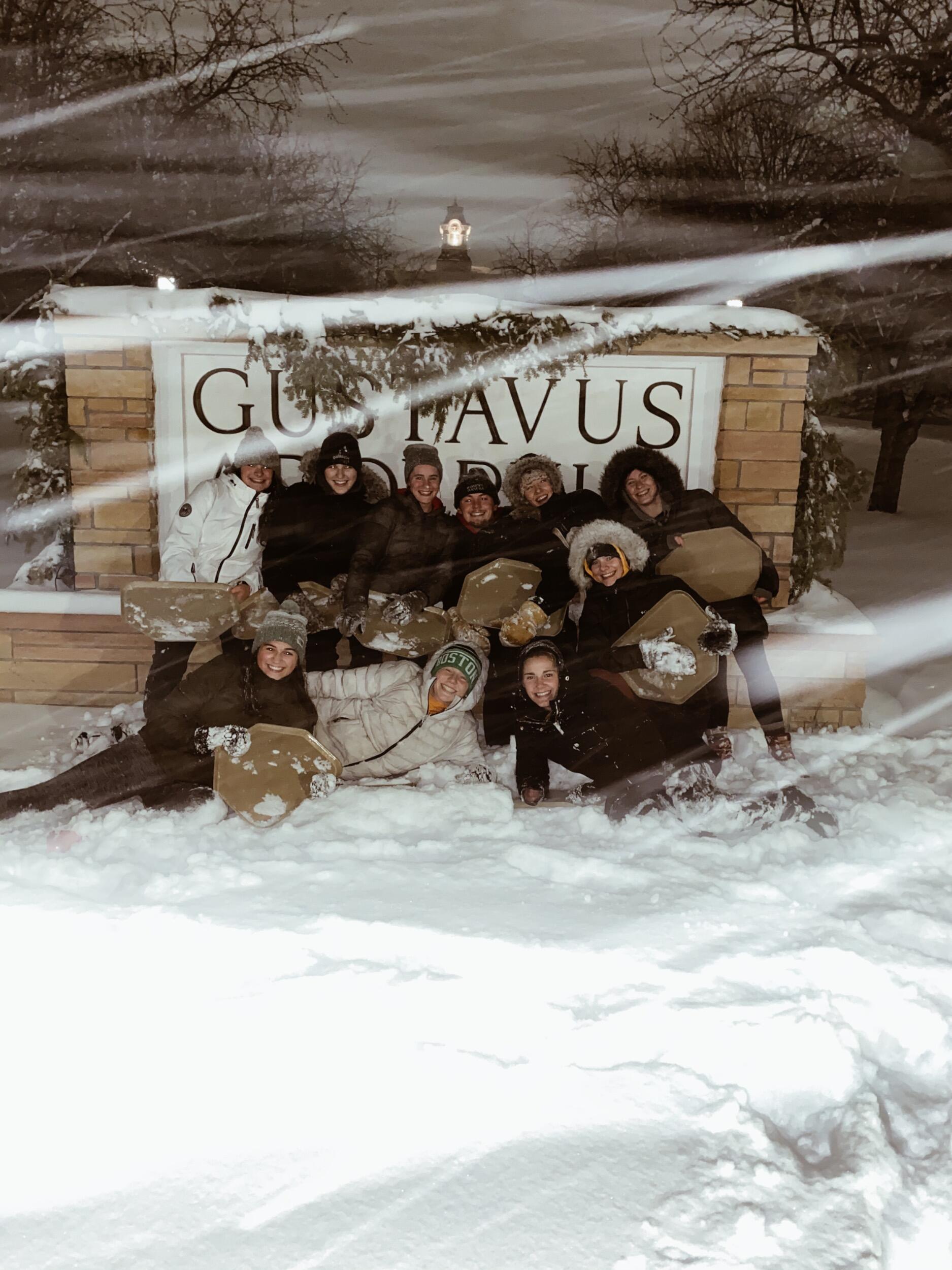Teague goes 'traying' down the hill with the Gustavus gymnastics team!
