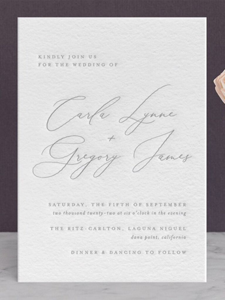 Classic script type of couple's names on letterpress material
