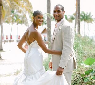 married couple during a beach wedding ceremony at Tranquility Bay in Marathon, Florida
