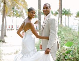 married couple during a beach wedding ceremony at Tranquility Bay in Marathon, Florida