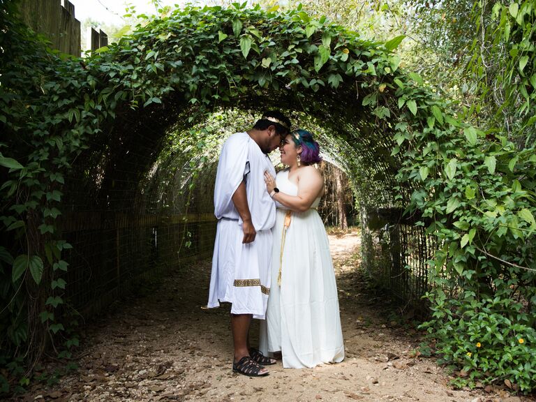 Couple dressed up for their summer engagement photo shoot. 