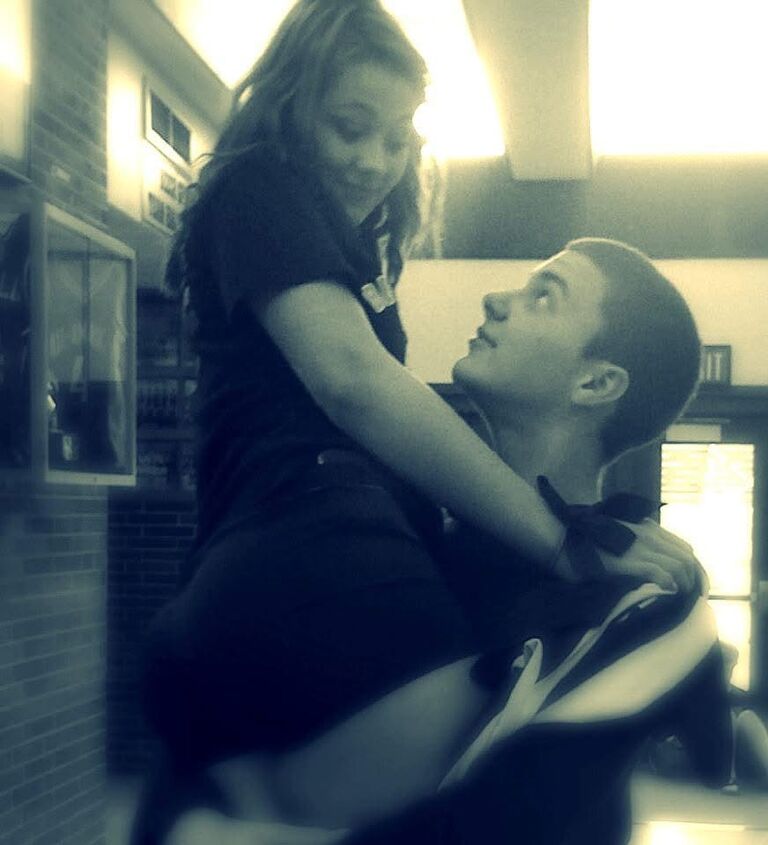 The moment that started it all—our first photo together in high school.