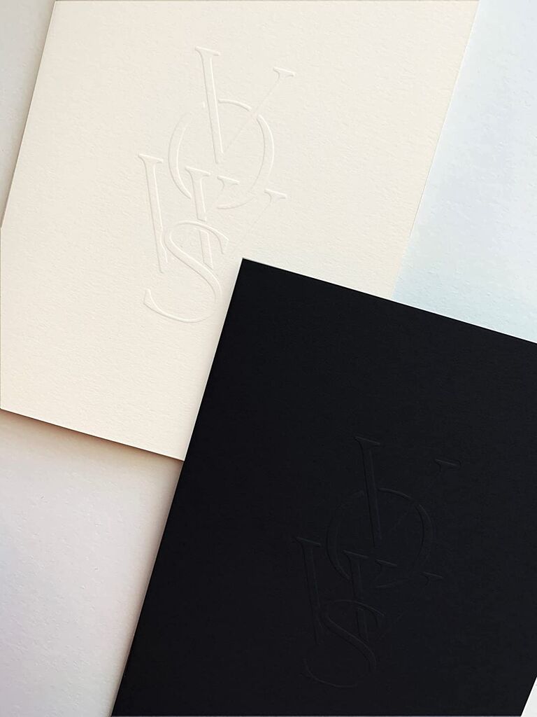 modern black and white vow books with blind embossing