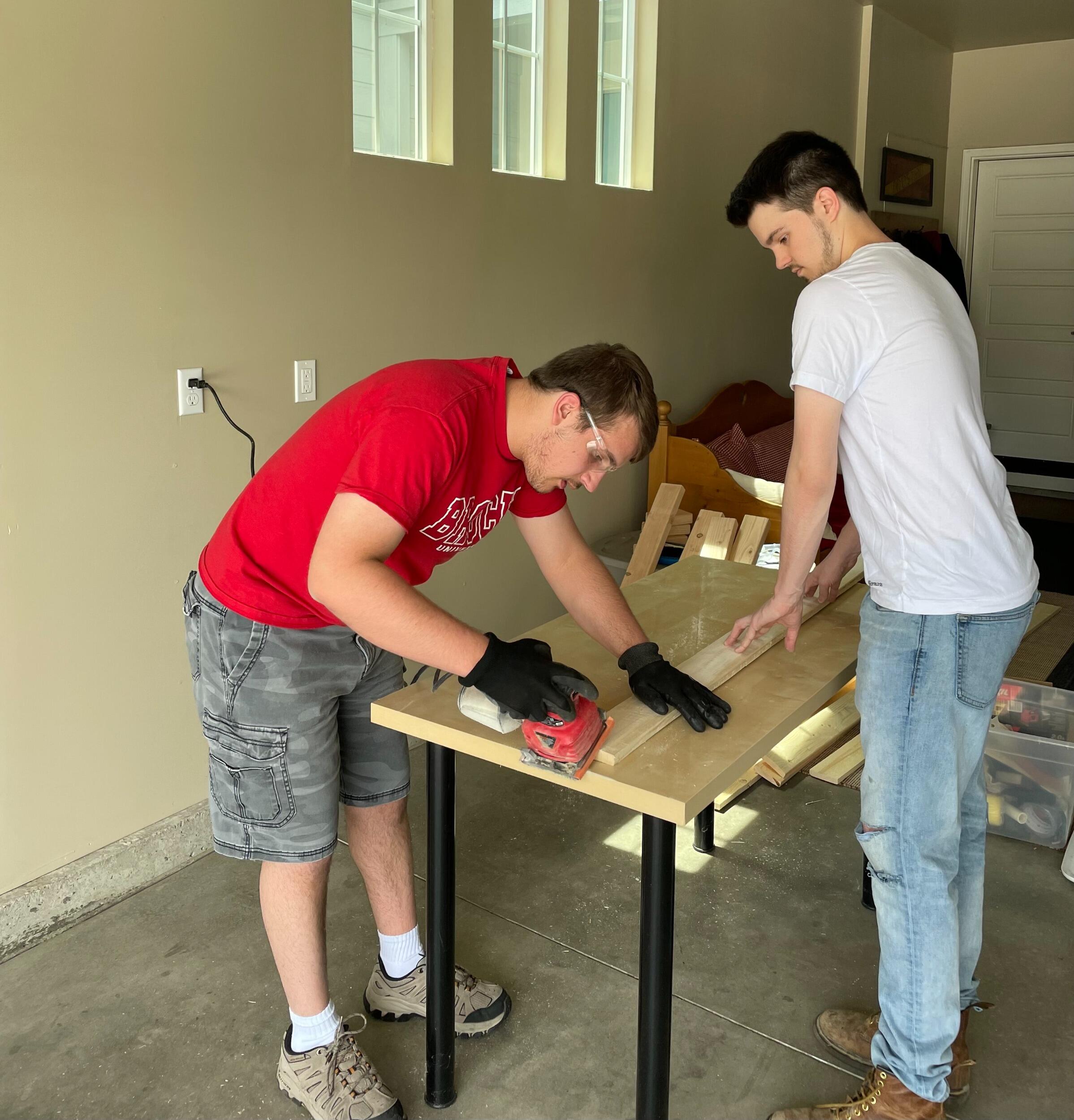 Not long after meeting Sarah's family, Sam was promptly put to work and he and Sarah's brother, Thomas, built a table together. Sam put his woodshop instructional skills to good use!