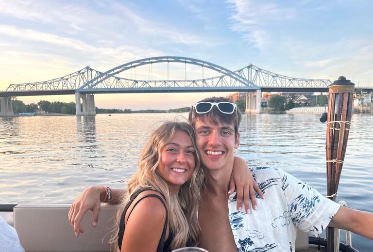 Enjoying the beautiful summer night on a tiki pub boat. 