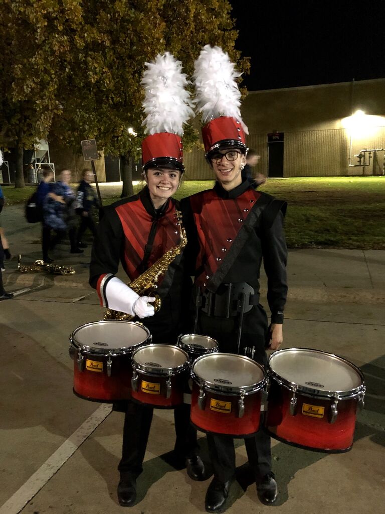 We did marching band together, Austin playing the tenor drums and Elli playing the alto saxophone. 