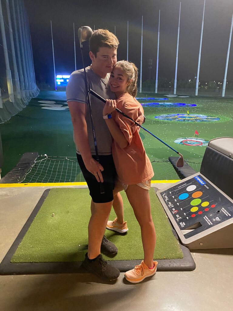 Top Golf! Gabby had a hard time getting the golf ball in the air, while Clark's golf ball repeatedly made it to the farthest part of the fence!...showoff 