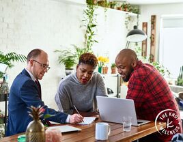 Couple meeting with financial advisor 