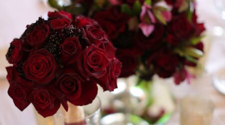 One Doz Red rose wrap bouquet arranged by a florist in Las Vegas, NV : Rosy  Flowers Event Design