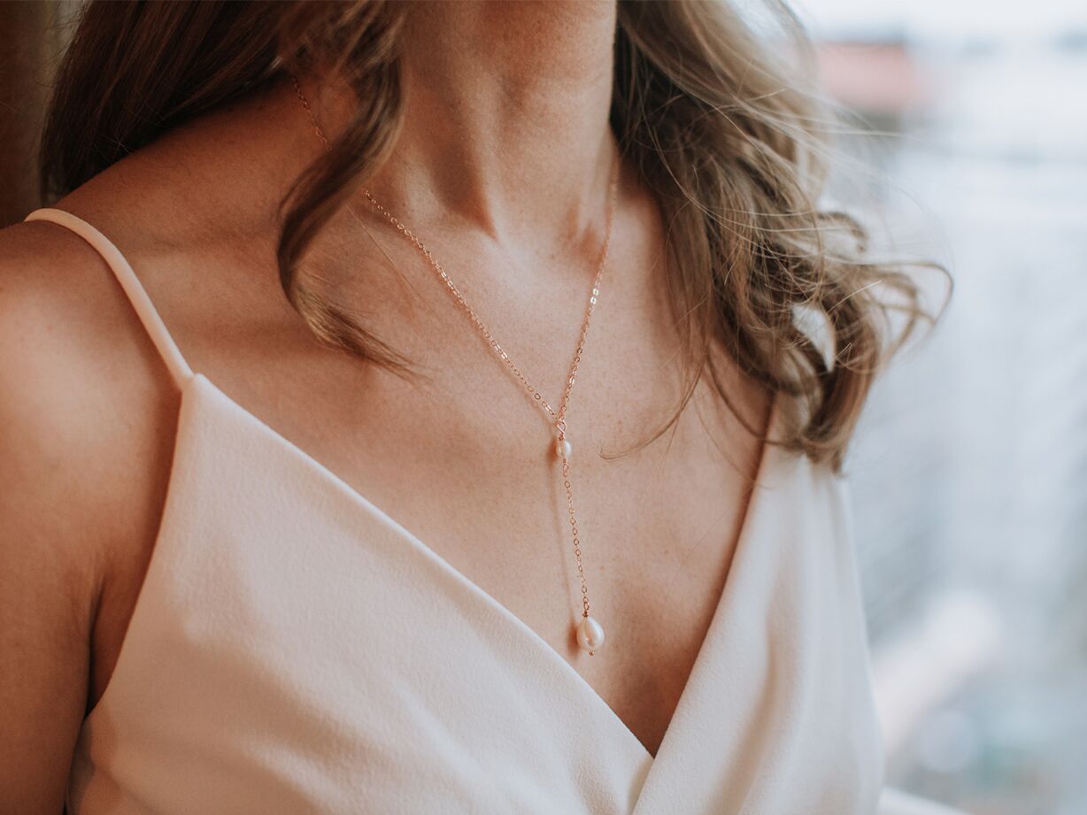 Bride wearing pearl necklace