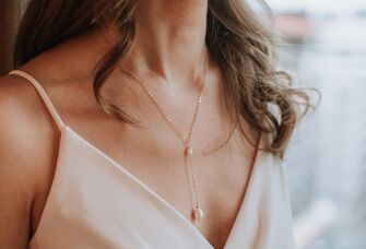 Bride wearing pearl necklace