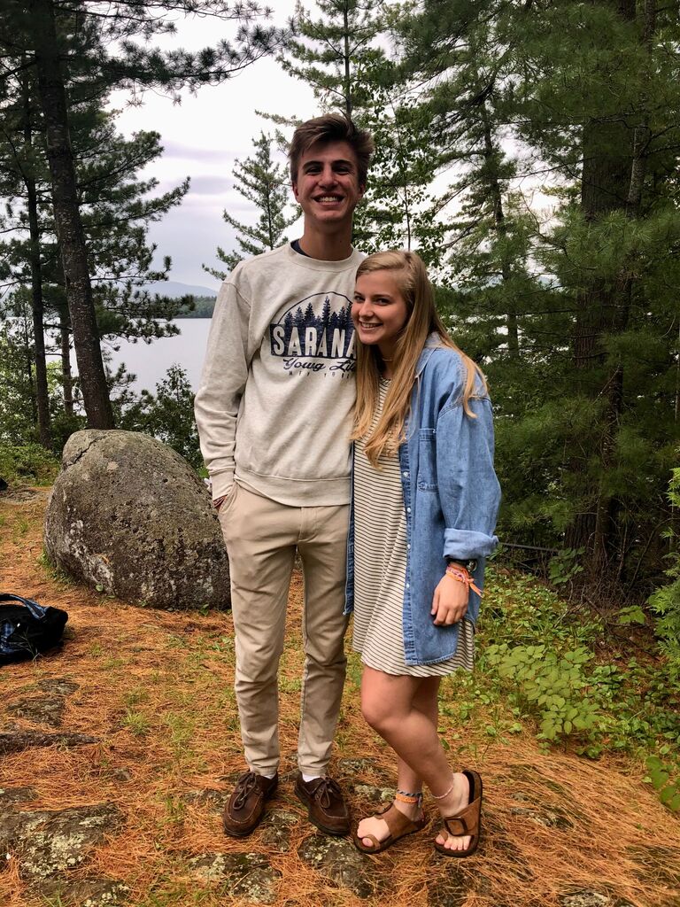 Drew and Bailey met at Saranac Village, a Young Life camp in the Adirondacks. The first day they didn't talk to each other at all. On the second day while raking the beach they finally started talking. This picture was taken on the last day when we could officially start dating.