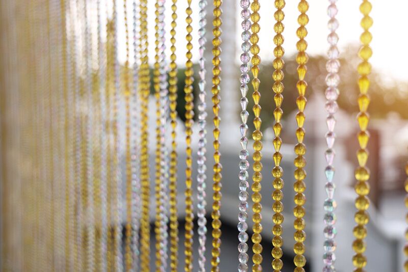 Gold and white bead curtain