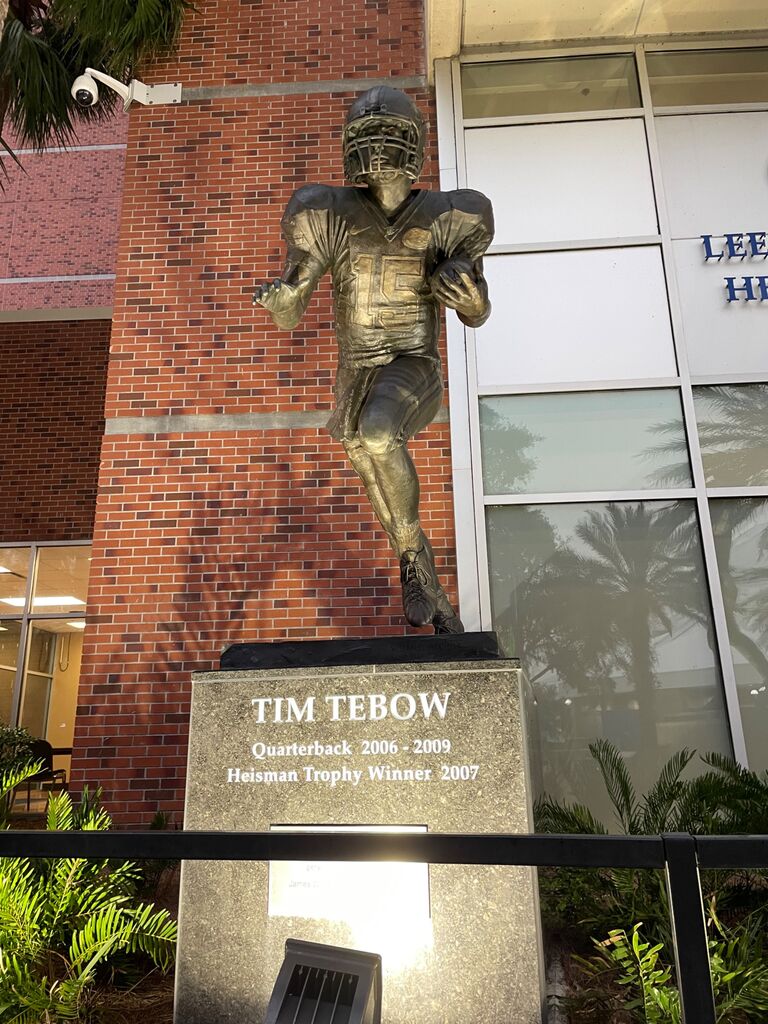 Samantha's Lord and Savior, Tim Tebow. Statue is outside of Ben Hill Griffin Stadium at the University of Florida. Chomp Chomp Chomp