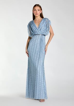 Mac Duggal
Embellished mesh fabric (100% polyester)
Fully lined body; unlined sleeves
V-neckline
Draped short sleeves
Tonal beaded waist detailing
Allover sequin and beaded embellishments
Concealed back zipper
Approx. 60" from top of shoulder to bottom hem
Available in Periwinkle
Style #23081