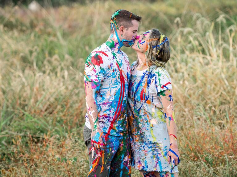 Paint-splattered summer engagement photo shoot. 