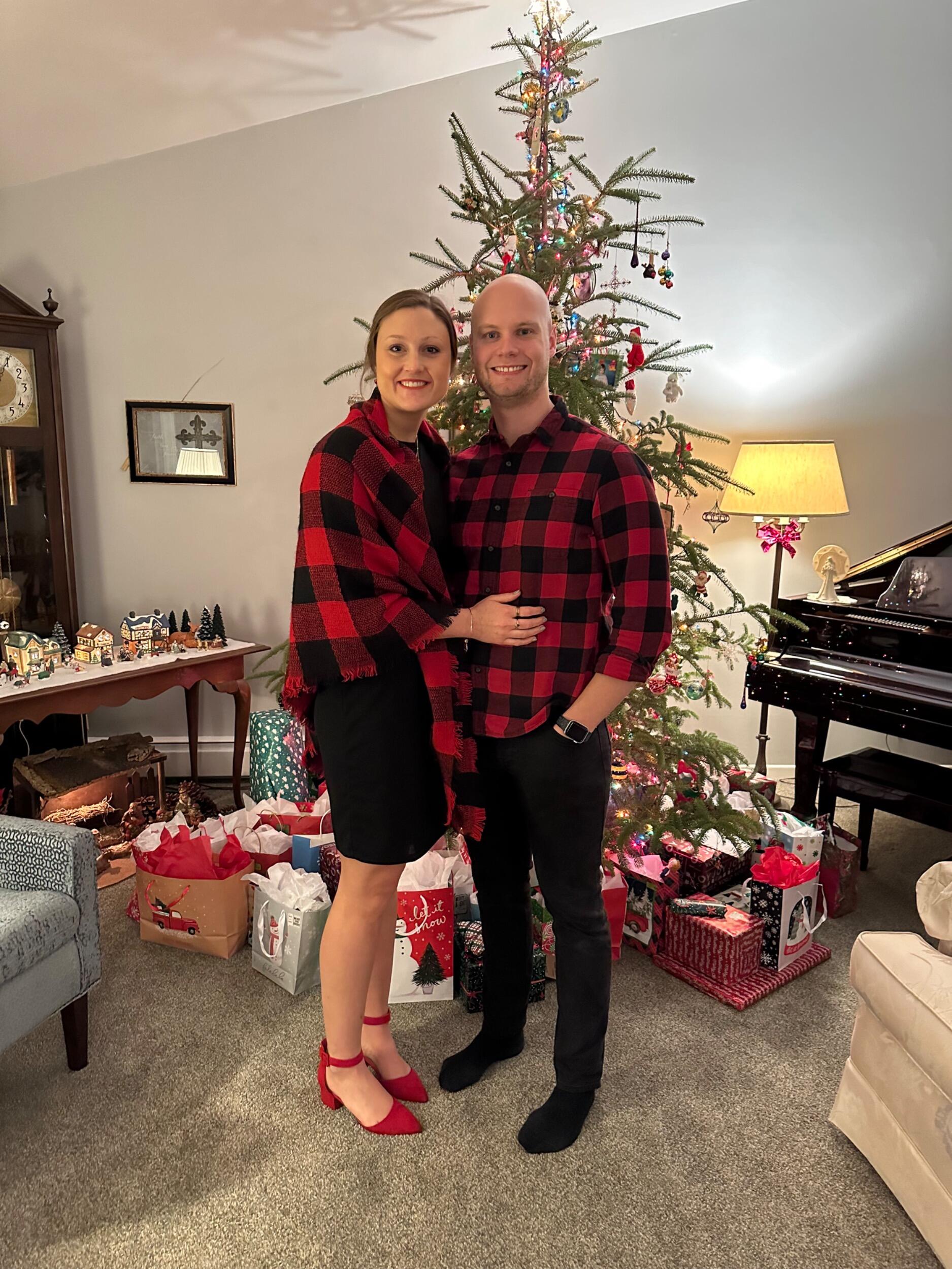 Celebrating Christmas at Katie's parents house with matching Buffalo Plaid (courtesy of Bren's mom)