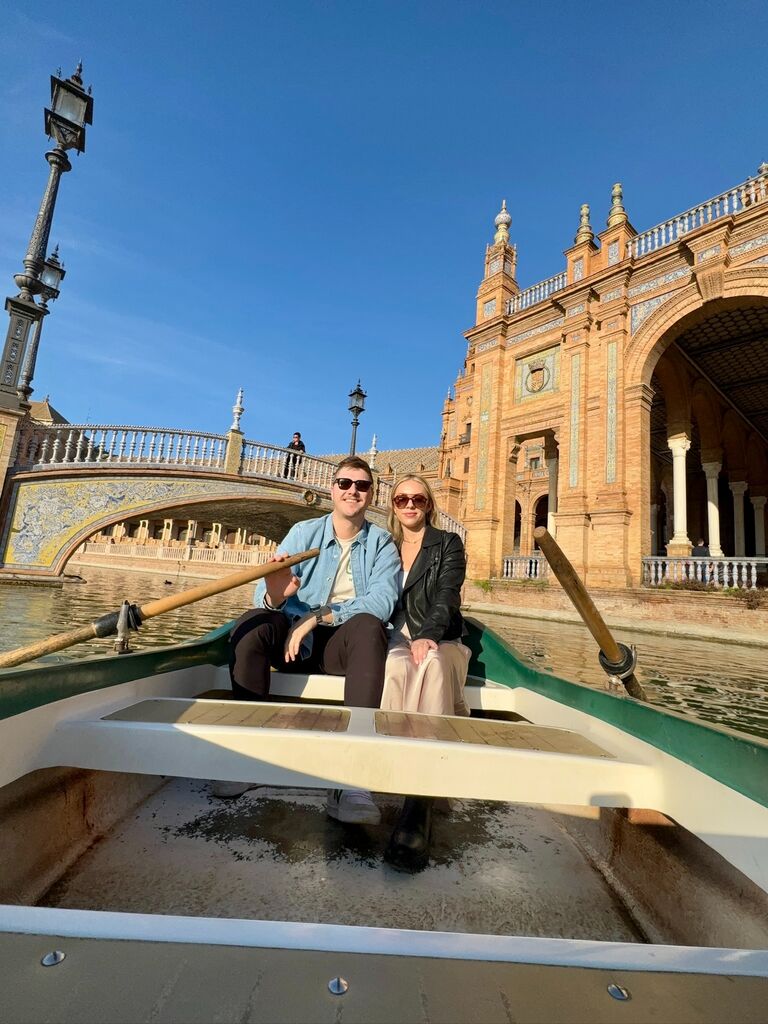 First Trip To Europe together!  
This photo was taken at the Plaza de Espana in Seville 