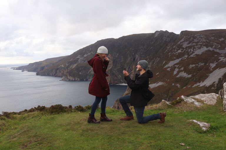 Dakota proposing on the cliffs of Slieve League with a temporary ring since the real one arrived in the mail the day we left to Ireland.