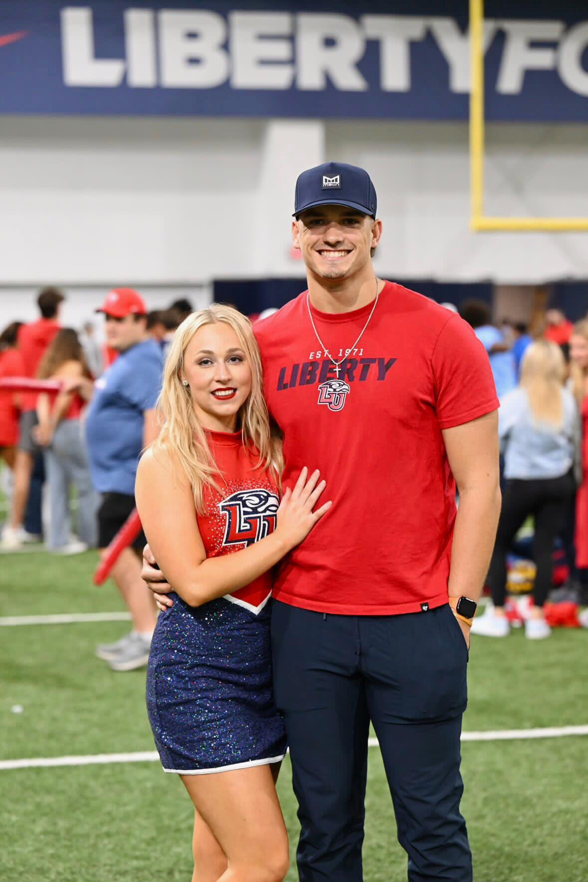 Noah supporting Liz at all her dance team events.