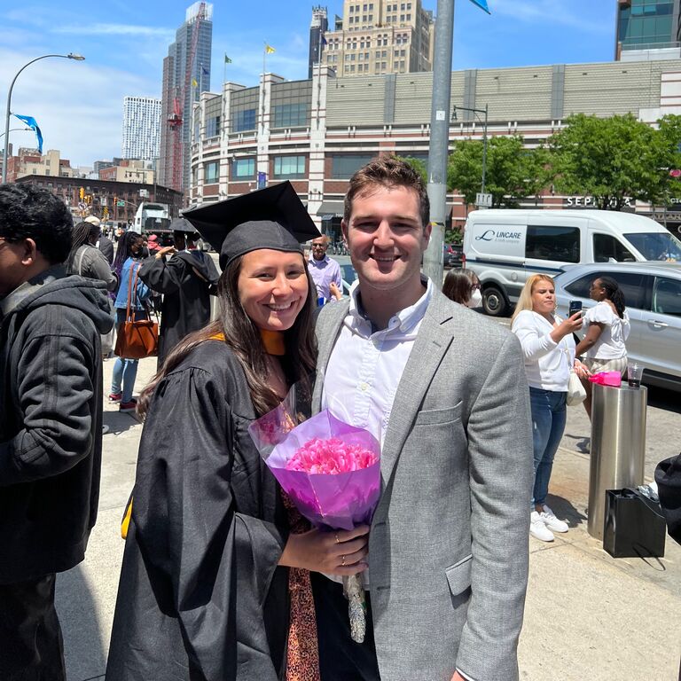 Talia earns her masters degree in industrial/organizational psychology, and of course, Mac cheered her on every step of the way.