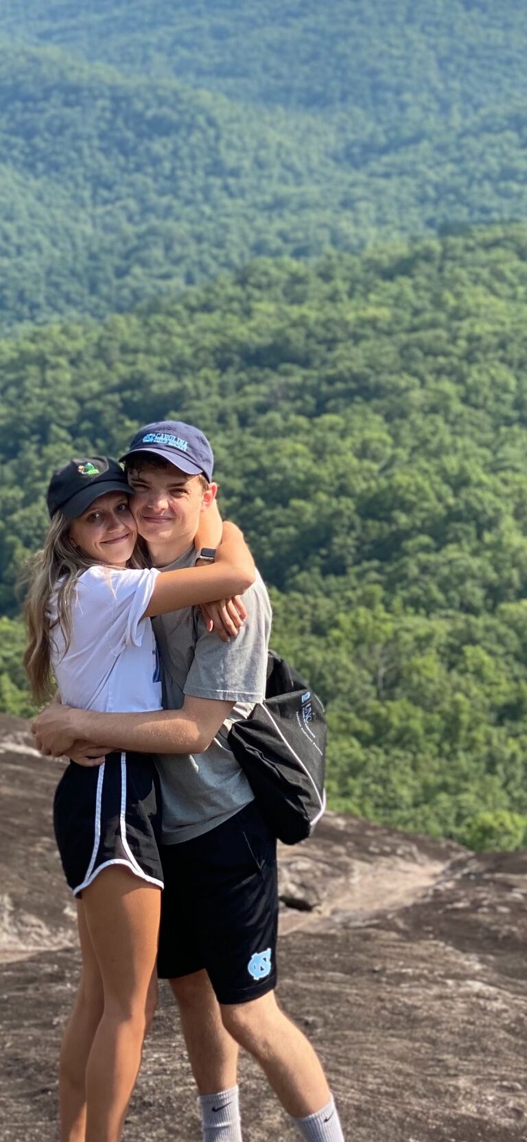Hiking up the mountain! Stephanie and Noah love hikes with friends (especially when there are snacks involved! 