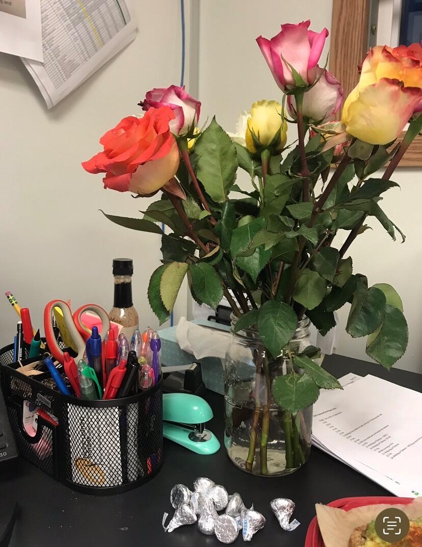Guy had each electrician on the job line up and bring Tanya a rose one by one for Valentine's day.  No one knew we were secretly dating yet so this was his way of being her valentine.
