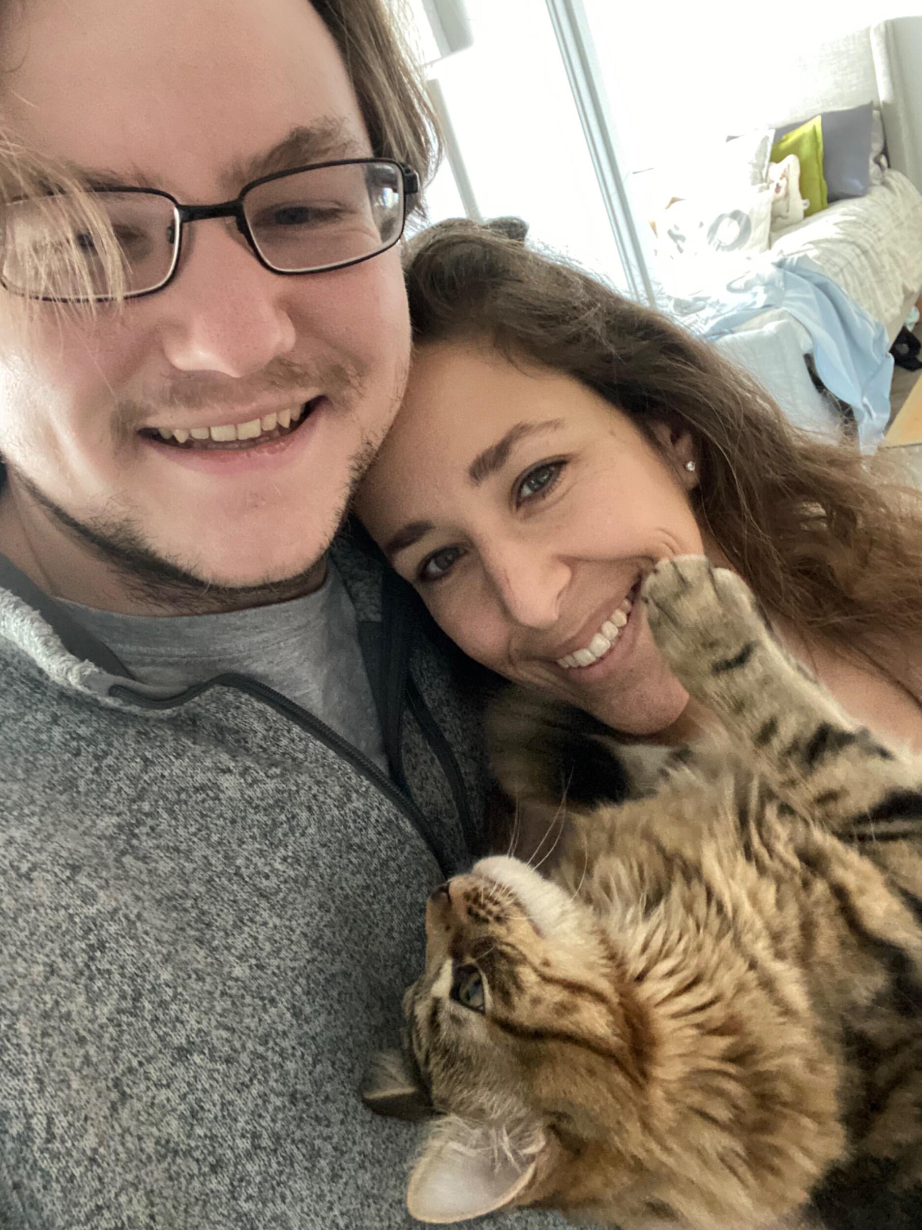 Somewhere along the way we adopted Romeo and have been forcing pictures with him ever since.