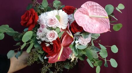 Two doz red roses wrap bouquet arranged by a florist in Las Vegas, NV :  Rosy Flowers Event Design