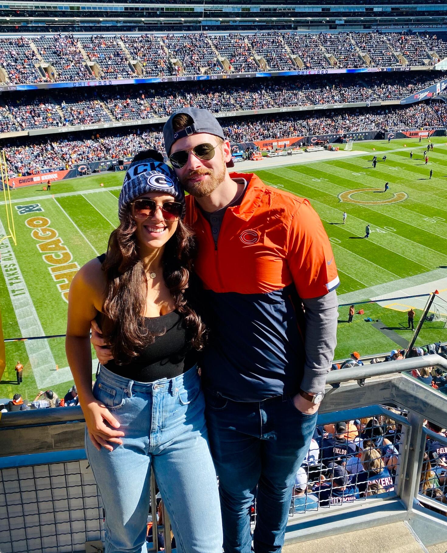2022 brought them many more date nights, music gigs, their first apartment, and fun trips including going to Chicago to see the Packers play the Bears! Nate's a huge Bears fan and had always wanted to see a game at Soldier Field. (Meanwhile Ali's a Packers fan and we're NOT going to talk about how Aaron Rodgers owned the Bears at their own stadium that day).