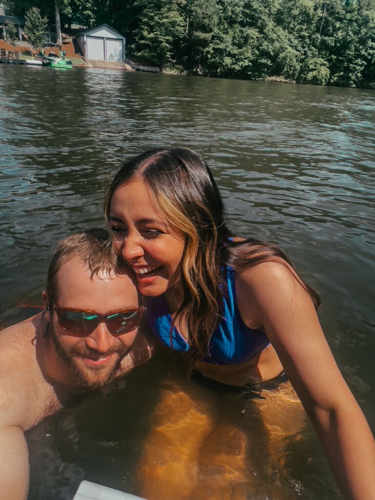 Memorial Day weekend…he was trying to pull me into the freezing cold lake 